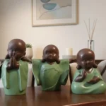 three buddhas statue